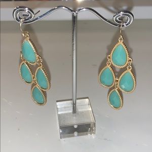 Turquoise and gold earrings.